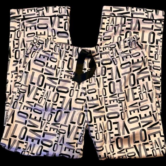 EUC Victoria’s Secret Light Pink Sating with Black Logo Sleep PJ Pants Size L - Picture 1 of 5